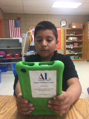 Programs OWL Nestor is enjoying his new tablet.
