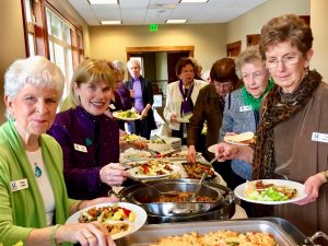 Members enjoy a delicious buffet luncheon at our regular monthly meeting