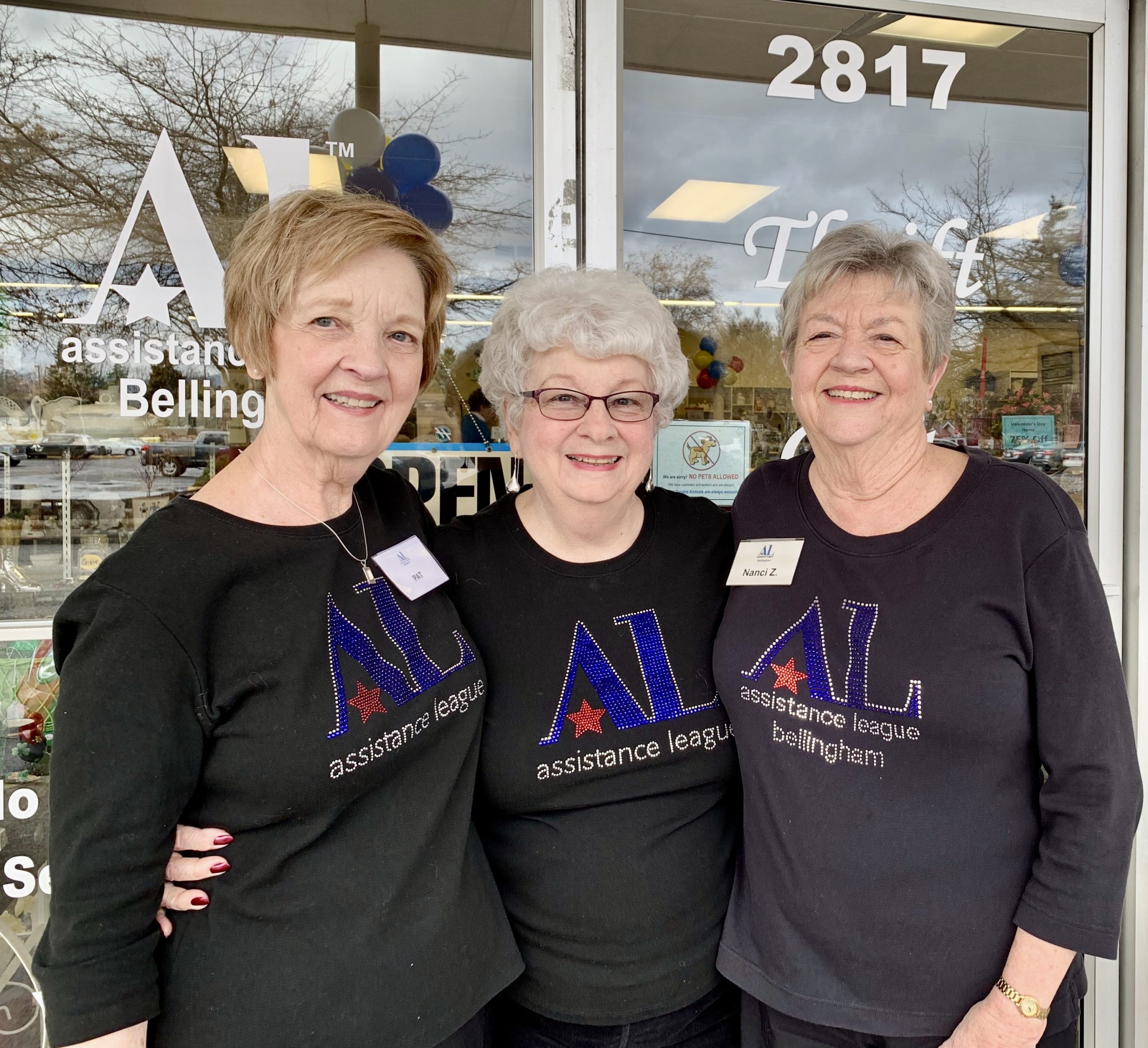 Three Assistance League Volunteers