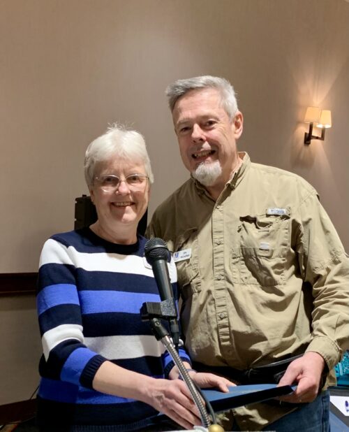 Sarah Spinks presents award to Jim MacLachland