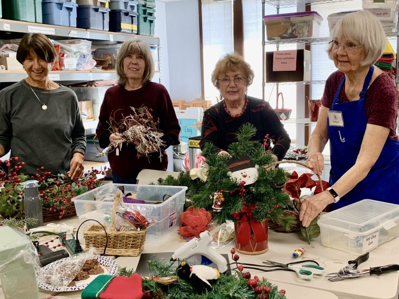 Assistance League members preparing Christmas decorations