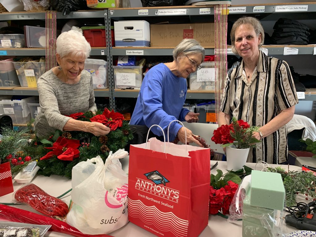 Assistance League members preparing Christmas decorations