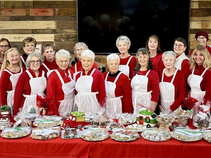 Assistance League Member group photo at Yule Boutique