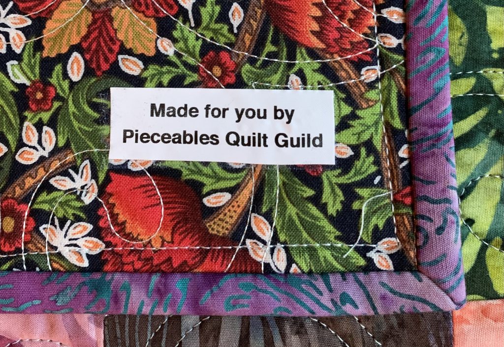 “Made doe you by Pieceables quilt guild”