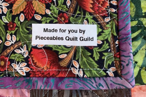 “Made doe you by Pieceables quilt guild”