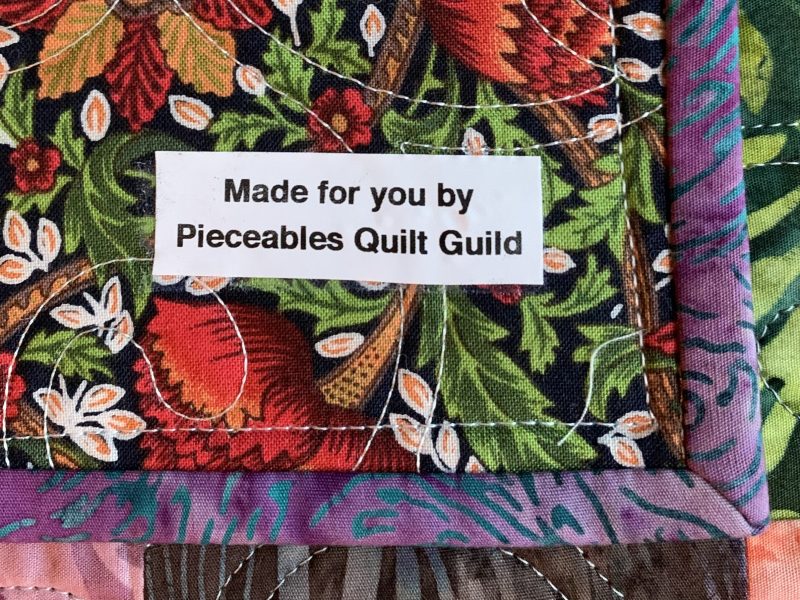 “Made doe you by Pieceables quilt guild”