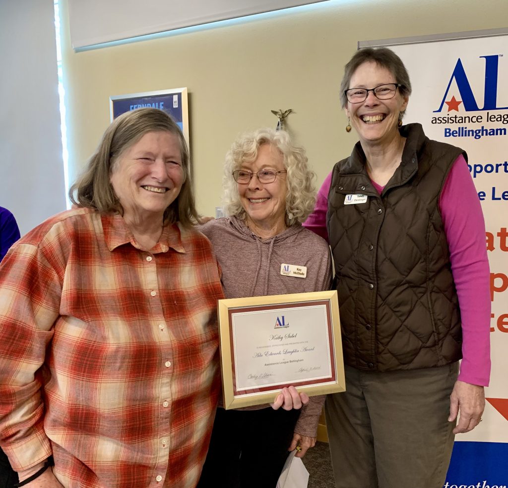 Kay McDade and Sandy Dentinger present Kathy sabel with Ada Edwards Laughlin Award