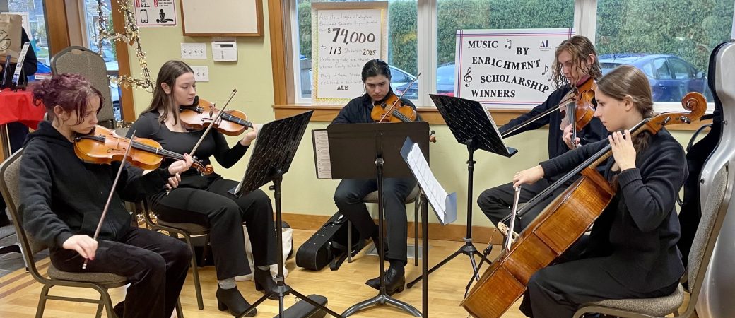 Enrichment Scholarship Students performing at Yule Boutique