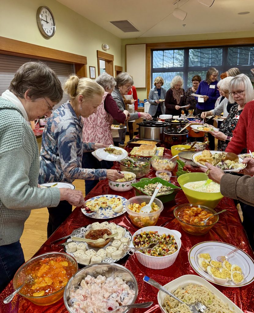Assistance League members enjoy potluck lunch