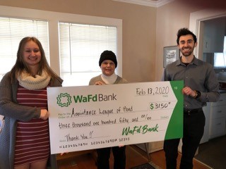 On February 13, Joan Craig (center), Grant Chairman, accepted a $3,150 grant from WaFd Bank (Washington Federal) for Assistance League of Bend.