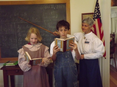 Docents dress as the School teacher and students follow school rules
