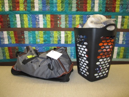 Empowering Youth "kit" with duffel bag and laundry basket stuff full of supplies