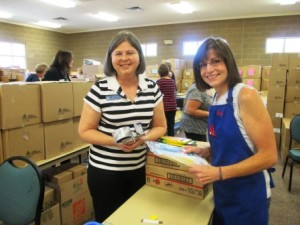 Members assembing school orders at Operation School Supplies