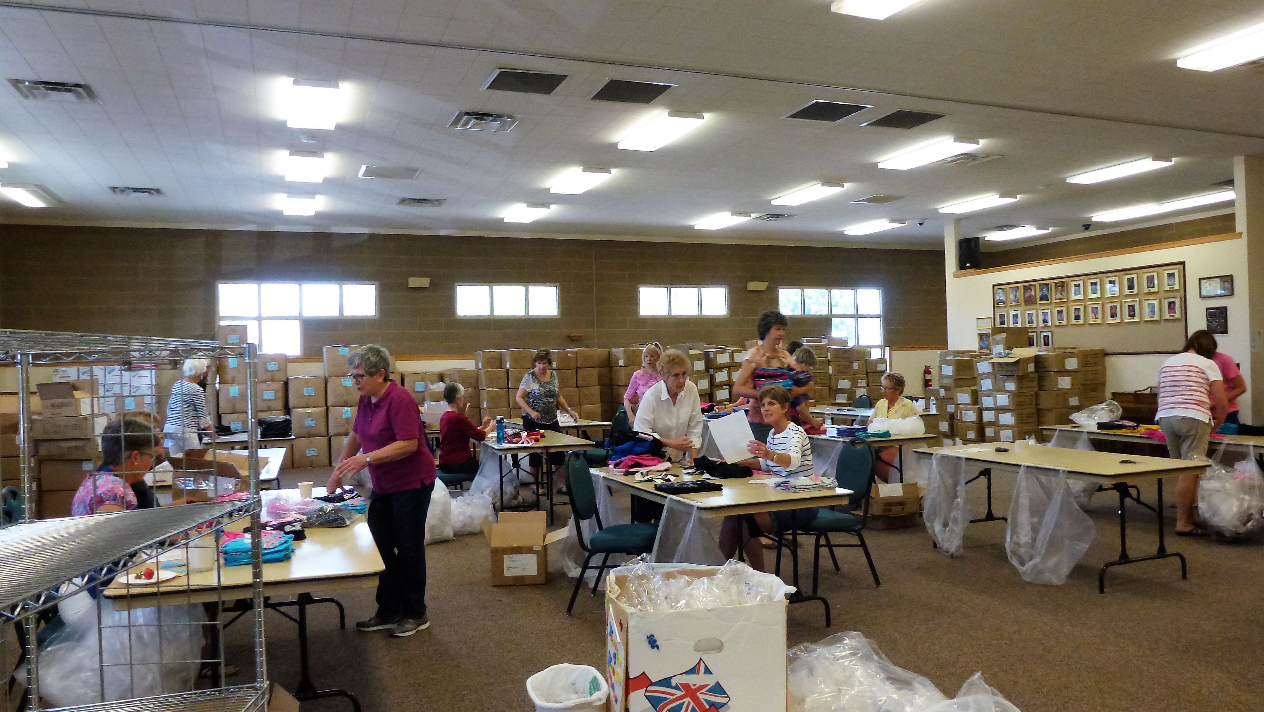 Members tagging clothing in preparation for Operation School Bell