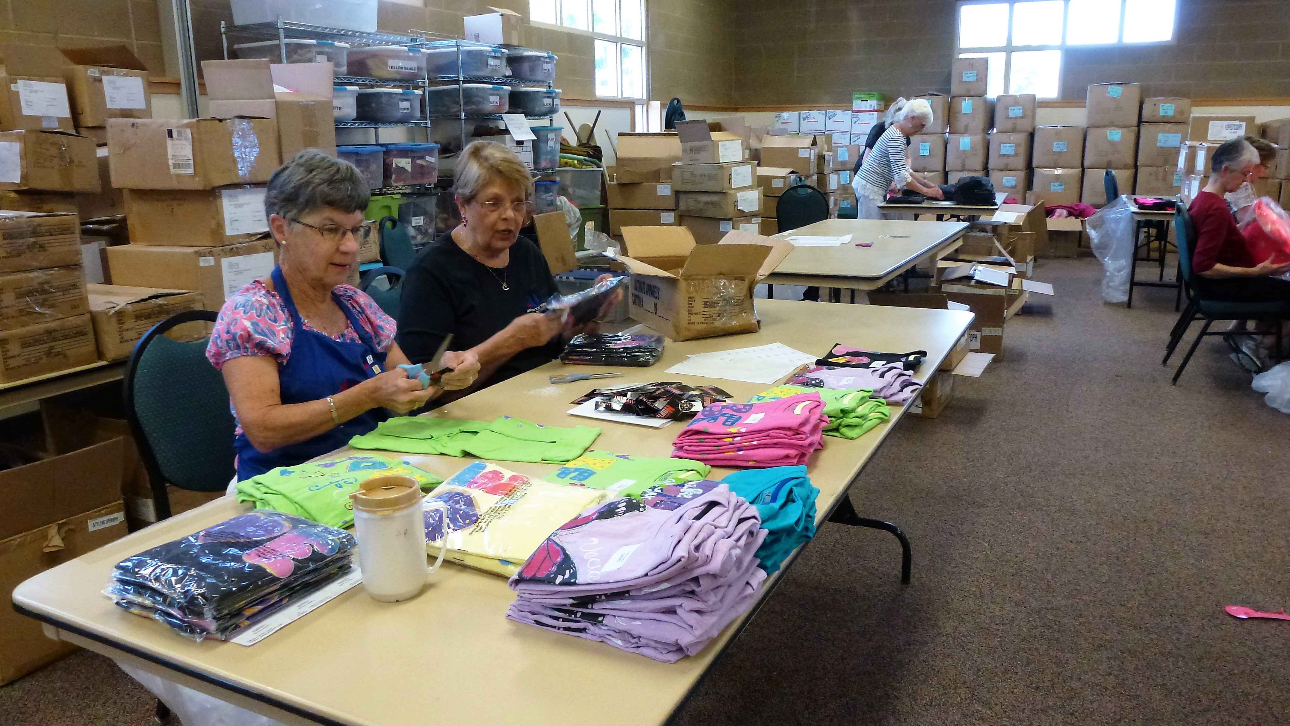 Members tagging t-shirts for Operation School Bell