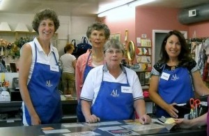 Members working at our Thrift Shop checkout desk