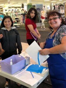 Student checking in at an Operation School Bell event