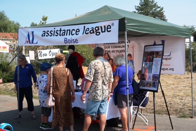 Visitors gathering around our booth at Experience Garden City