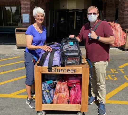 Volunteer delivering bundles to hospital staff