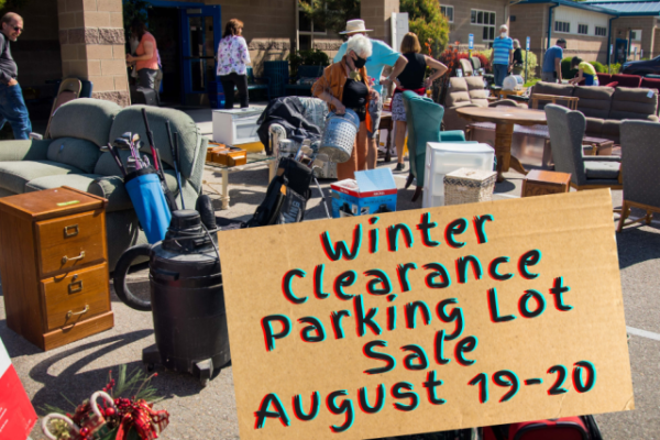 Goods in parking lot advertising winter clearance parking lot sale