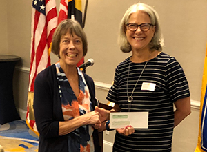 Parole Rotary Grants Committee Chair Prue Clendenning presents a $2,000 check to Maryann Gosnell, Assistance League of the Chesapeake Marketing Communications Chair