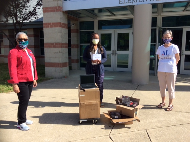 Assistance League members deliver Chromebooks to elementary schools