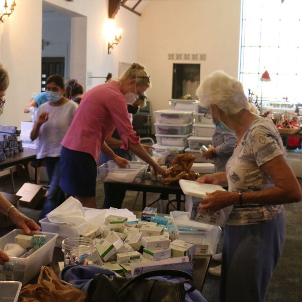 Packing health kits, kits stacked on the side copy