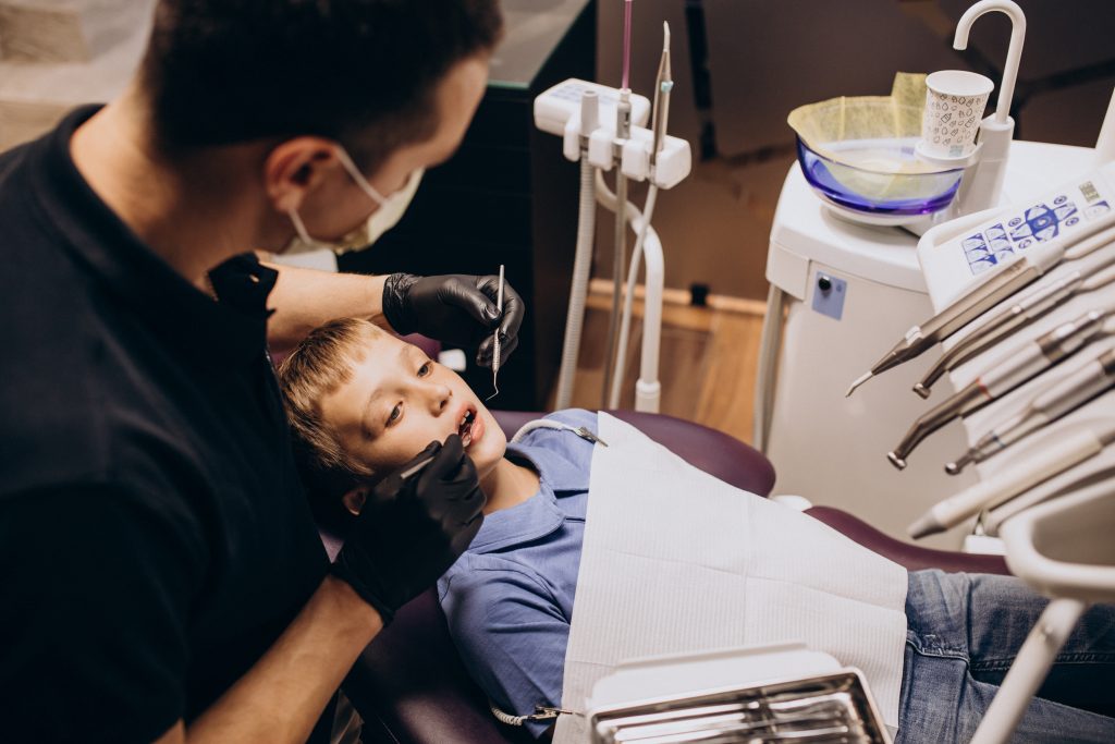 Little boy patient at dentist