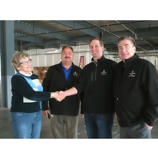 From left: Lynn Barron, Assistance League, Phil Hicks, Adam Dowling, Mike Eastman Sandy Spring Bank )