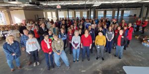 shot of volunteers at weekend food for kids packing