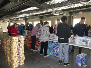 Food packing by ALNV Members supporting Weekend Food for Kids