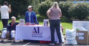 ALNV officers and members at the table for the shred event