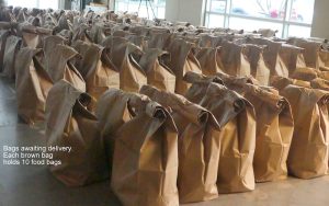 Rows of brown bags ready to be packaged and delivered