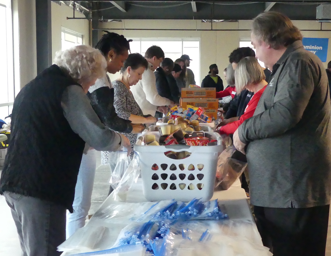 ALNV and Dominion energy volunteers participate in a Weekend Food for Kids packing event