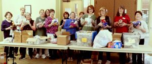 ALNV members display the various packages they've made as part of the Bedtime hugs event.