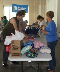 ALNV members making packages for the Bedtime Hugs program