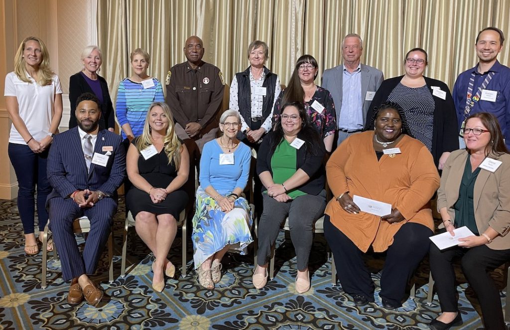 Awardees of the The Giving Circle of Heritage Hunt grant stand together for a photo.