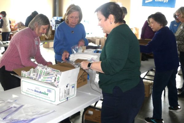 ALNV members help pack toiletries for children in the NoVA region