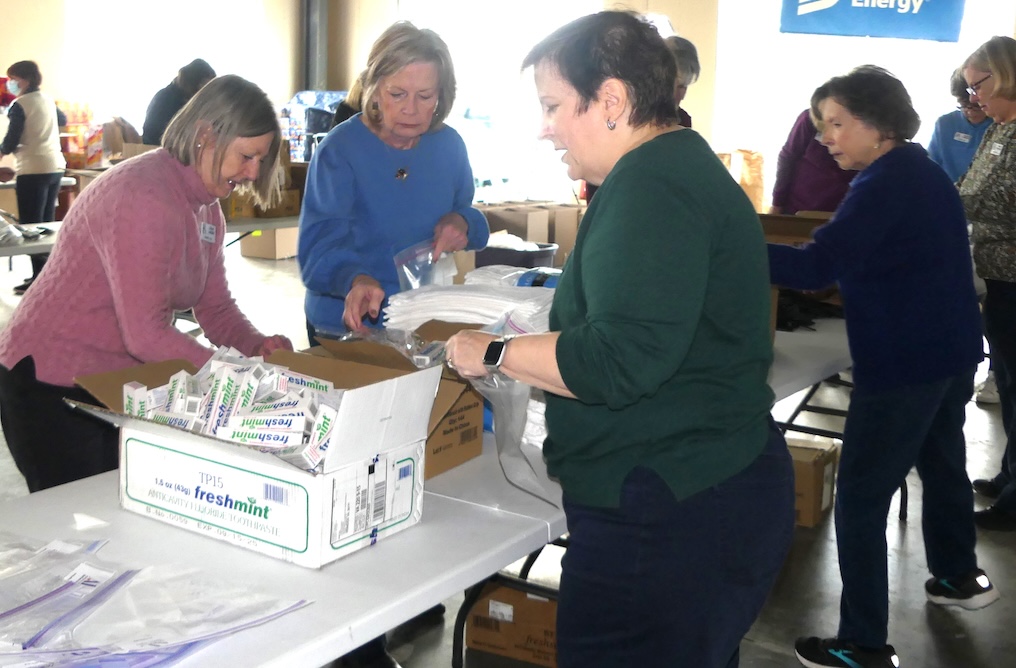 ALNV members help pack toiletries for children in the NoVA region