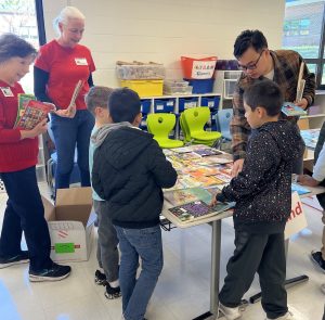 Students discuss which books they'd like to choose