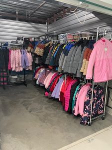 Image of coats on racks