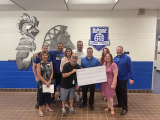 McQueen gets $10,000 award
