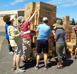 Unloading pallets of uniforms from the truck