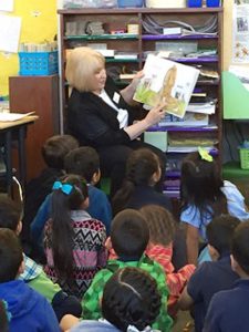 Readers Are Leaders - reading to students at Stipe Elementary