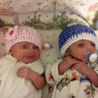 Newborn twins in Hats