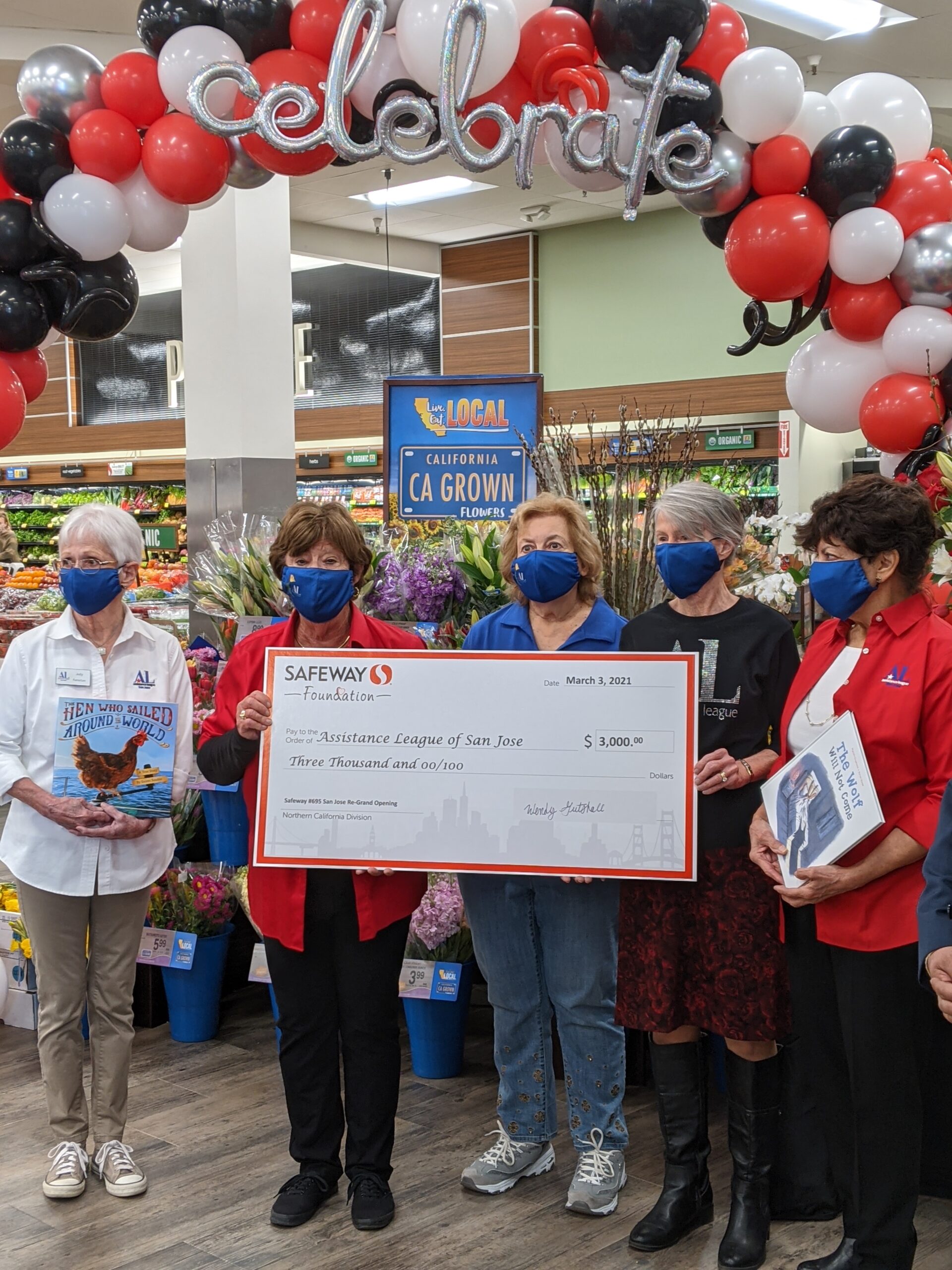 Receiving a big check from Safeway