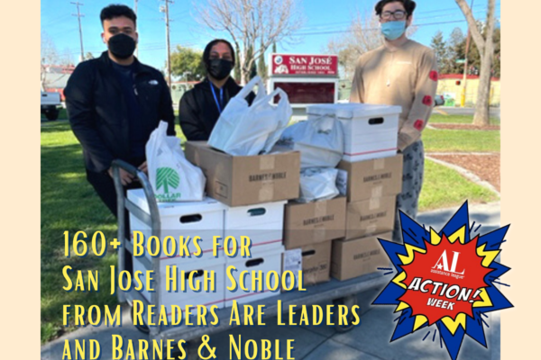 Students accepting 160+ books from Readers Are Leaders and Barnes & Noble