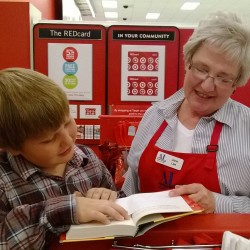 Distributing books during Operation School Bell event