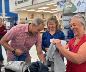 Allan Priest, Advisory Council Member, teams up with member volunteers at Placerville Walmart shopping event.