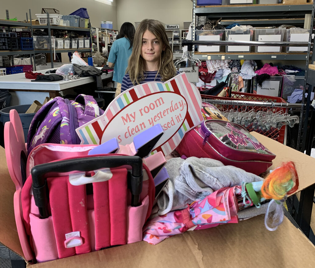 Fourth grader, Evelyn, donates to our thrift shop!